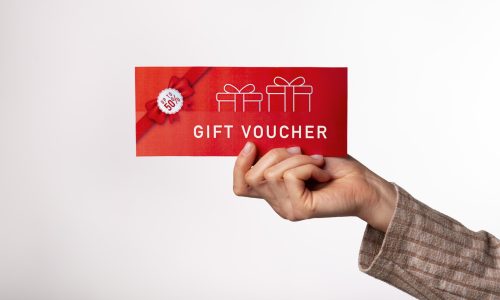 beautiful-gift-voucher-with-hand