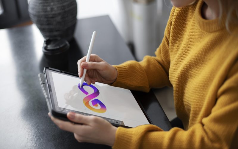 female-logo-designer-working-graphic-tablet