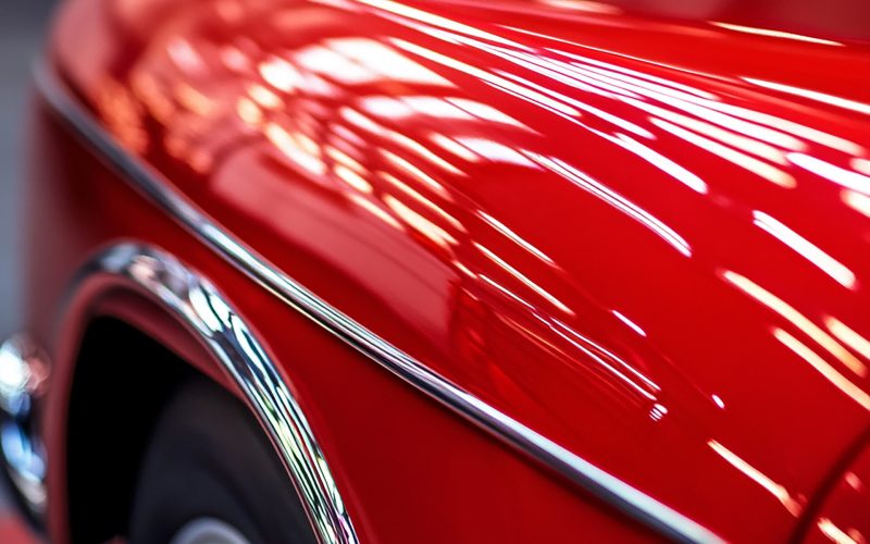 red-car-with-word-s-side